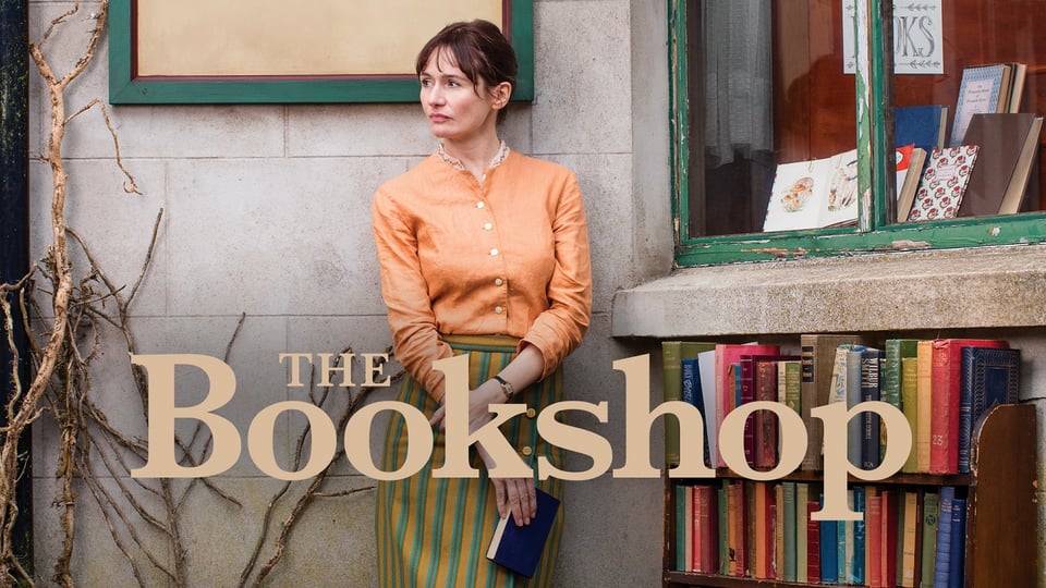 Woman standing infront of bookshop